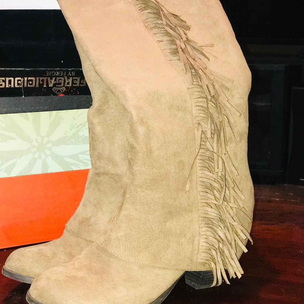 Fringed tan suede boot.